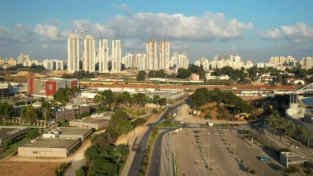 Urban aerial video of the city of Netanya with the team's official stadium in the background, Israel