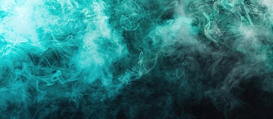 Obraz premium Blue and green cloud of smoke of black isolated background. Background from the smoke of vape. Copy space image. Place for adding text and design