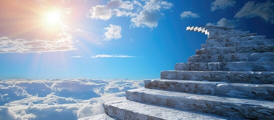 stone stairs, like a path to the blue sky and white clouds, with sunlight shining, like a ladder to the heaven. Copy space image. Place for adding text and design