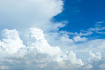 Thick clouds in summer blue sky. Cloudy bright beauty in the sun, bright and calm summer air background.