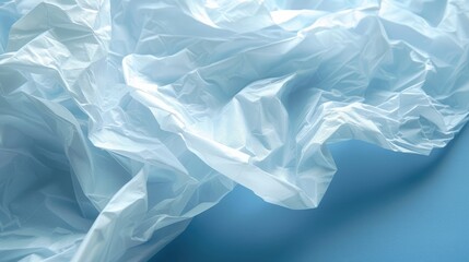 Obraz premium Wrinkled tissue paper Tissue on a blue surface