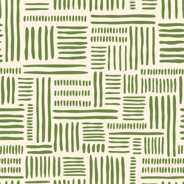 Green geometric tribal patchwork seamless pattern. Hand drawn lines, striped tropical wallpaper, organic print, summer textile design. African boho folk motif, cute ornament. Vector illustration.