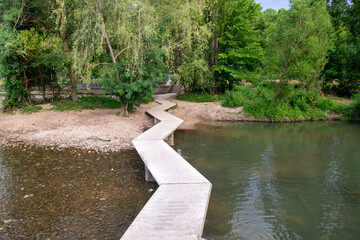 wooden bridge over the river
