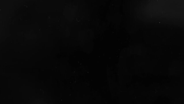 light is moving over a smartphone or camera display screen showing many fingerprints and dust, nice lens vfx overlay or layer element, 50p and 4k.