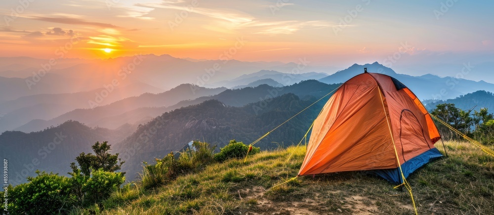 Poster camping tent in the top of mountain in the morning. copy space image. place for adding text or desig