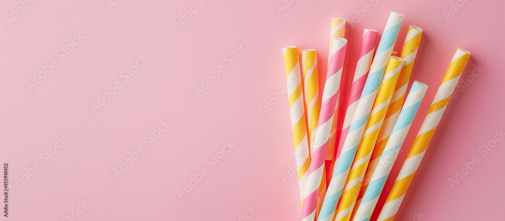 Poster different paper cocktail straws on pastel background. copy space image. place for adding text and de