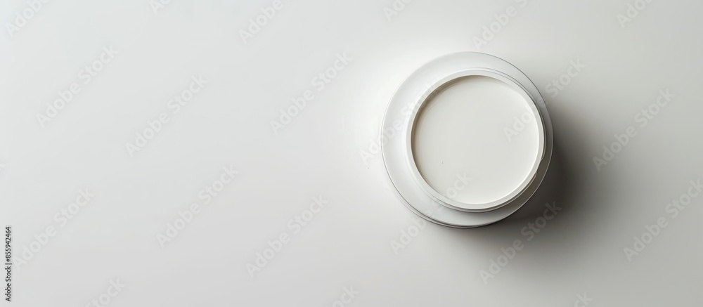 Poster top view of blank cosmetics jar isolated on white. copy space image. place for adding text or design