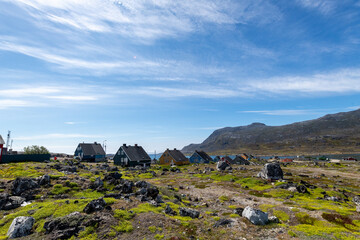 Greenland Nanortalik town landscape with traditional colourful houses on a sunny day
