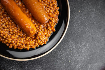 lentils with sausages fresh meal food snack on the table copy space food background rustic top view