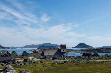 Greenland Nanortalik town landscape with traditional colourful houses on a sunny day