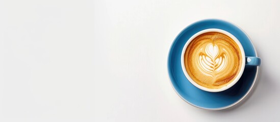 Cappuccino or latte with frothy foam, blue coffee cup top view closeup isolated on white background. Cafe and bar, barista art concept. Copy space image. Place for adding text and design