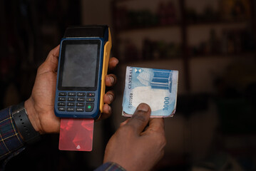 Point of sale pos machine and Nigerian banknotes cash