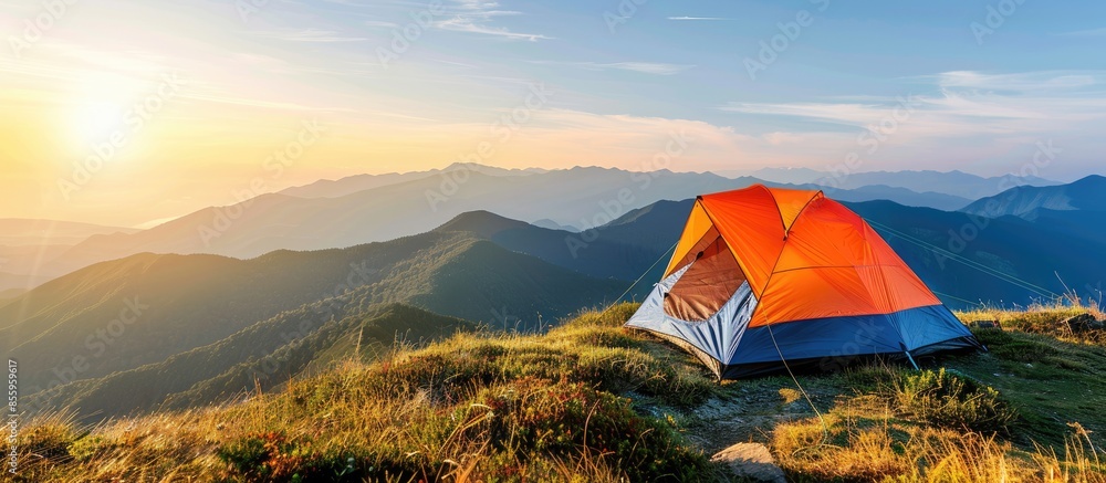 Poster camping tent in the top of mountain in the morning. copy space image. place for adding text or desig