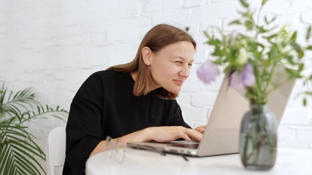 Overworked caucasian woman with vision problem, squints working on laptop suffer eyestrain, businesswoman freelancer overload with computer work feels discomfort exhaustion blurry vision bad eyesight.