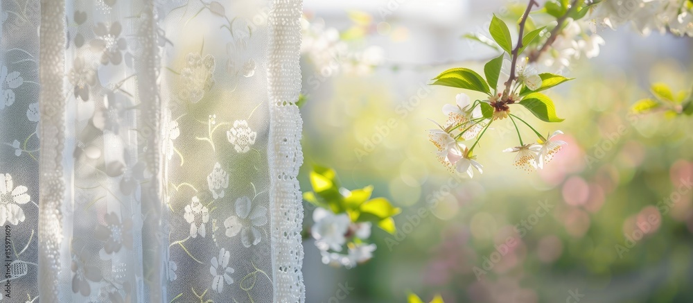 Poster closeup of modern white lace curtains with view through glass window on garden in spring or summer w