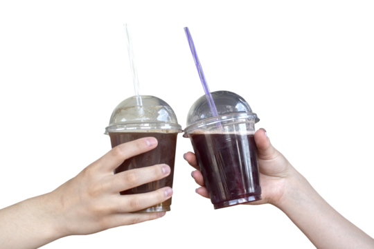 Two hands holding a plastic glasses with a drink isolated