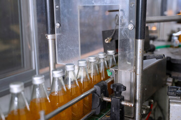 Automation Machine is working at beverage factory.
