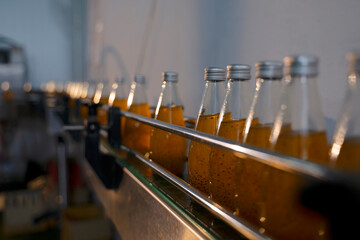 Automation Machine is working at beverage factory.