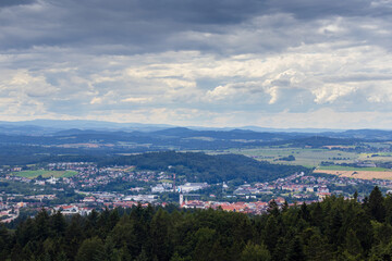 Aerial view to city Pisek from lookout with overcast sky. History Czech town, tourism background