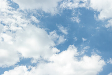 White clouds on a blue clear sky