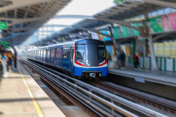 Fototapeta premium BKK BTS Bangkok Mass Transit System Sky train which is an elevated tram over the busy streets oh BKK Thailand 