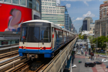 Naklejka premium BKK BTS Bangkok Mass Transit System Sky train which is an elevated tram over the busy streets oh BKK Thailand 