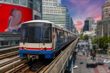 BKK BTS Bangkok Mass Transit System Sky train which is an elevated tram over the busy streets oh BKK Thailand 