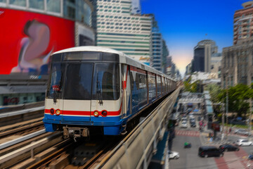 Fototapeta premium BKK BTS Bangkok Mass Transit System Sky train which is an elevated tram over the busy streets oh BKK Thailand 