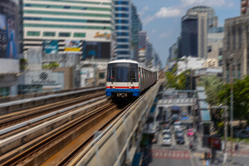 Fototapeta premium BKK BTS Bangkok Mass Transit System Sky train which is an elevated tram over the busy streets oh BKK Thailand 