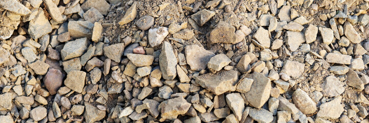 Panoramic image. Coarse gravel for road construction. Gravel background