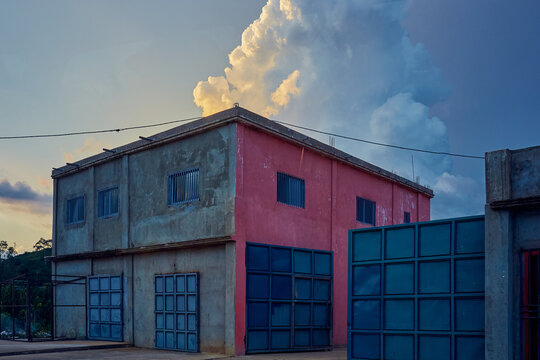 Concrete framed building at sundown in Angola