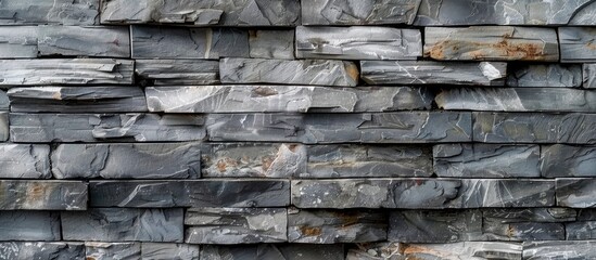 Texture, background, pattern. Natural stone lined wall. Hard rock chunks or solid mass, as well as a piece, vertical part of the building premises. with copy space image