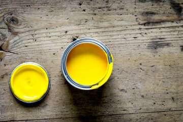 building decoration instruments with paint, brush wooden background top view mock up