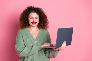 Photo of gorgeous pretty cute woman wear stylish khaki clothes buy modern device isolated on pink...
