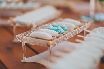 Candy Bar. Sweet holiday buffet with cupcakes and other desserts. Delicious wedding reception candy bar