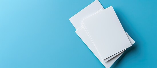 Two white cards with Merit and Demerit letters on the blue background. with copy space image. Place for adding text or design