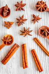 Cooking with vanilla, cinnamon on kitchen table background top view