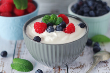 A bowl with Greek yogurt with berries