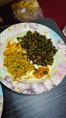 Fried Ladyfingers (Bhindi) yellow daal and salad