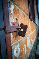 Rusty Metal Security Lock on Brick Wall limited access internet security Concept no entry secret