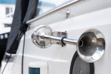 Closeup of a chromed foghorn on a yacht. Air horn boat. Nautic gear