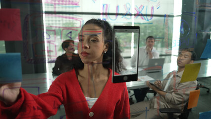 Portrait of hispanic businesswoman present start up marketing idea to investor. Female leader...