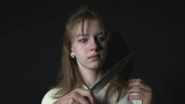 Maniac killer pursuing beautiful young woman with knife, attack on defenceless victim