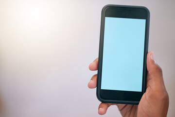 Person, hands and phone with mockup screen for research, social media post and internet scroll in office. Employee, marketing space and mobile in palm with online review for website, text or sms app
