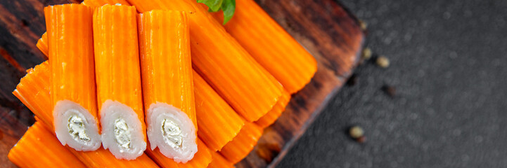 crab stick stuffing cream cheese and herbs natural fresh appetizer meal food snack on the table copy space food background rustic top view © Alesia Berlezova