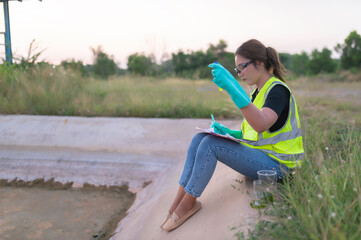 Environmental engineers inspect water quality,Bring water to the lab for testing,Check the mineral content in water and soil,Check for contaminants in water sources.