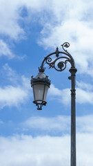 Ethereal Lamp Against Azure Sky
