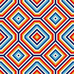 Bright ethnic abstract background. Seamless pattern with symmetric geometric ornament. Ornamental vivid wallpaper. Vector illustration