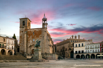 Plaza Mayor of Trujillo, Cáceres, Extremadura, Spain, with the church of San Martin de Tours in the background at sunrise.