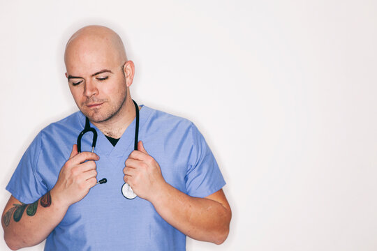 Medical: Male Nurse Holds Stethoscope